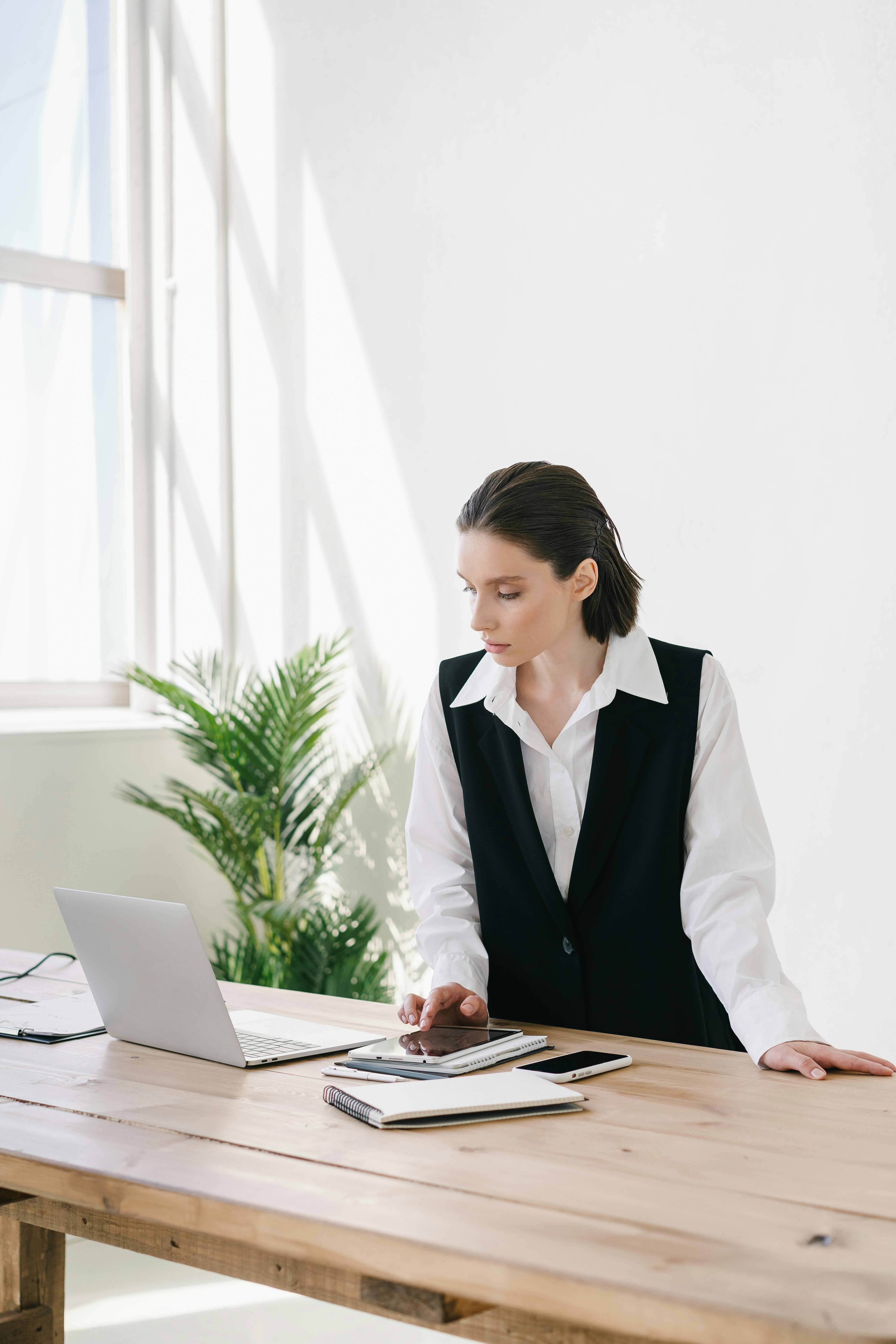 Woman sitting at desk editing an NDA