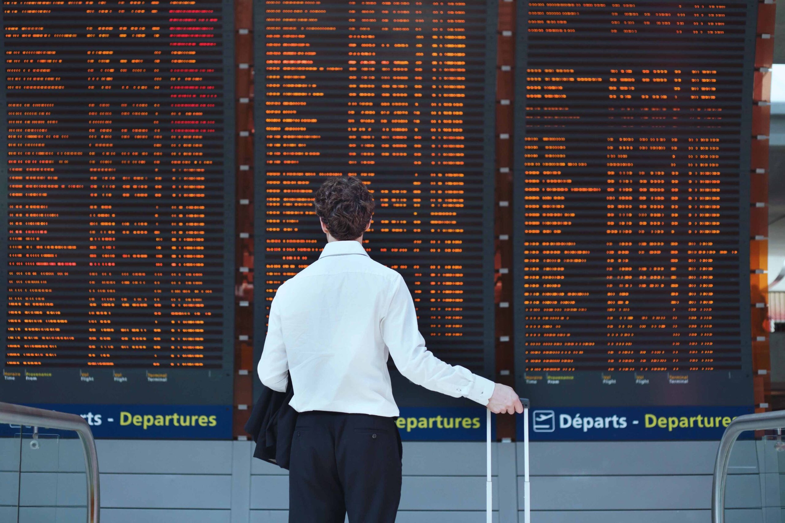 passenger looking at timetable